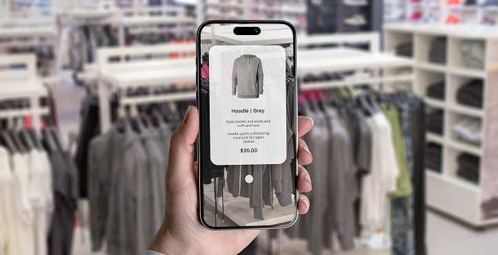 hand holding a phone with a shopping app